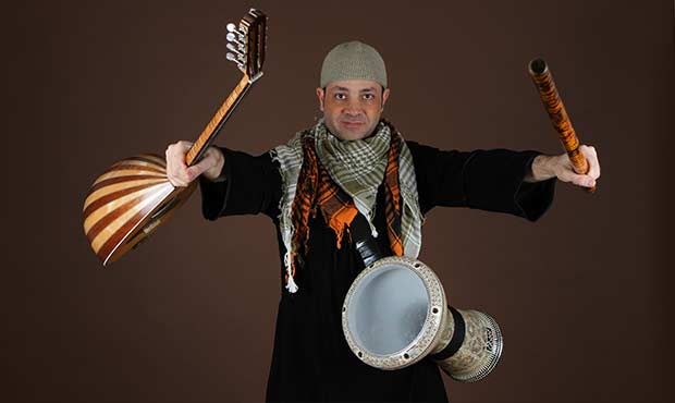 Karim Nagi holding Traditional Muslim Instruments